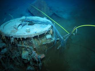 S1 stbd forward 4-inch HA Gun and mount inverted on seabed